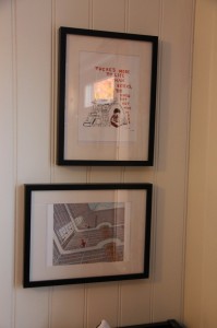 Two prints hung